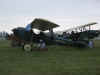 OSH09 Don E on phone under cover at Oshkosh.jpg (1275172 bytes)